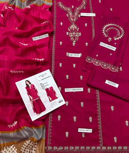 Magenta embroidered unstitched dress fabric set with embroidered patterns, dupatta, and trousers.