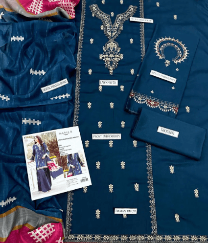 Unstitched blue embroidered suit fabric set with digital print, front embroidery, and trousers displayed flat.
