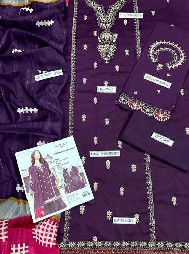 Embroidered unstitched purple suit set with neckline detailing, matching dupatta, and patchwork