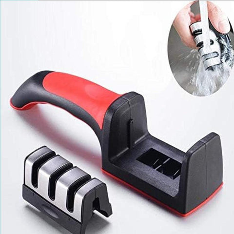 Handheld kitchen knife sharpener with red-black handle and removable sharpening slots